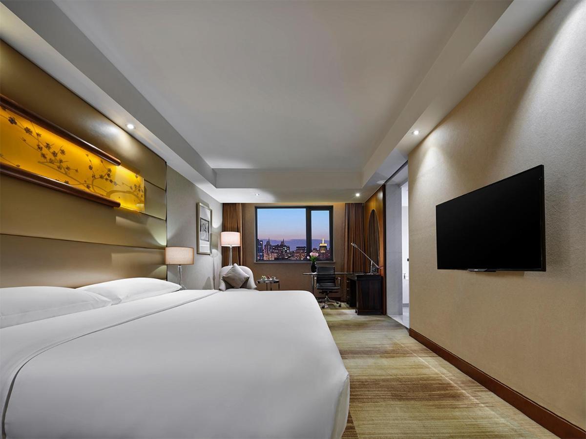Gehua New Century Hotel Beijing Pequim Exterior foto