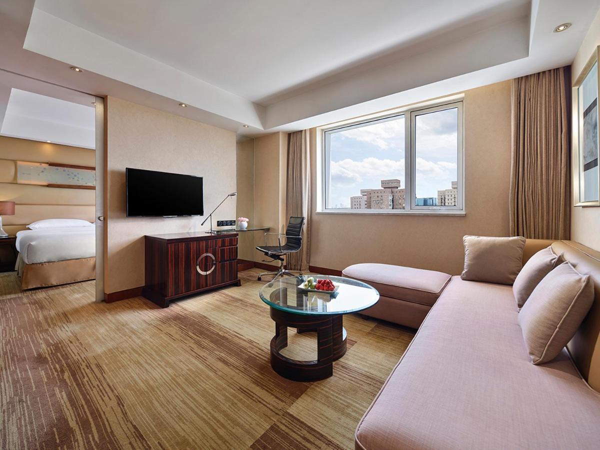 Gehua New Century Hotel Beijing Pequim Exterior foto